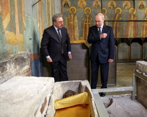 Putin visits newly unearthed remains of medieval Russian prince
