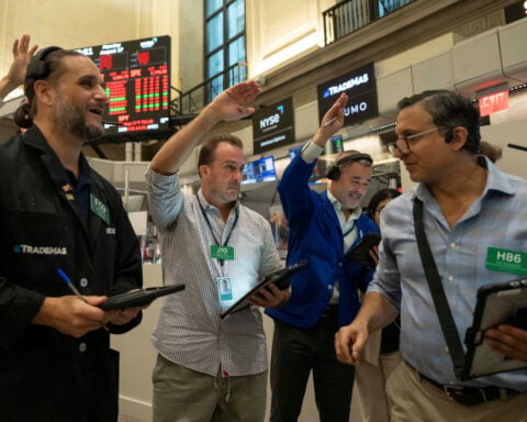 US stocks rise, even as the bond market applies more pressure