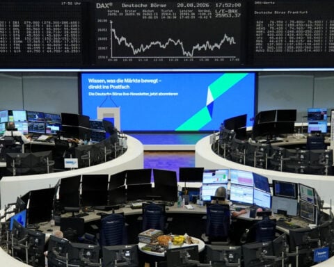 Global stocks close out a tough week as bond yields, oil stay high