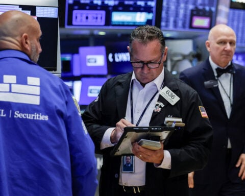 Wall St rises on the day but falls for the week; bond yields and Iran in focus