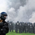 German Cup match marred by fireworks, pitch invasion
