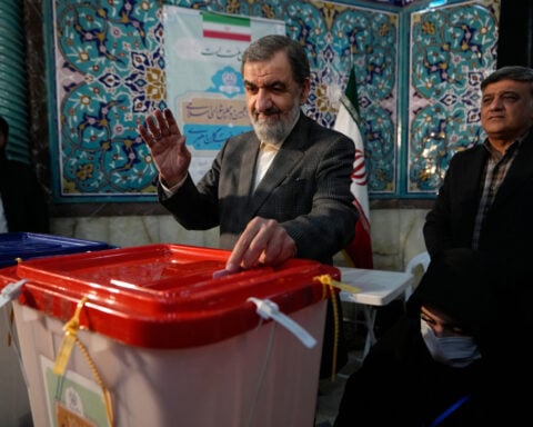 Iran security chief threatens neighbors against economic measures, and other Mideast developments