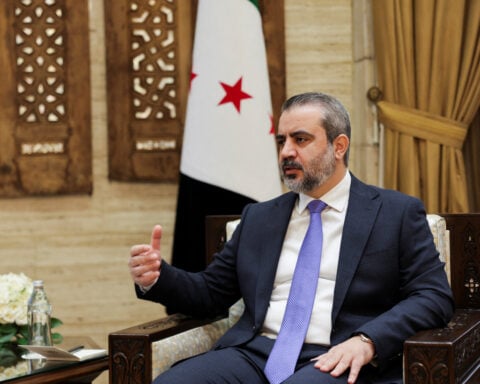 Syria foreign minister sees Israel security talks resuming despite no trust