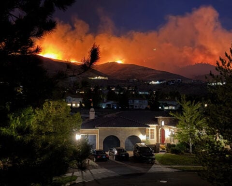 Nevada’s Hawk Fire blamed on human activity, official says, as 90,000 urged to flee