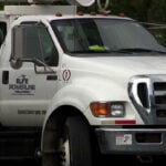 Contracted crews wait for orders in Griffith as NIPSCO faces mounting criticism over power outage response