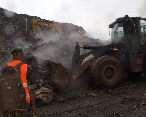 A landslide at a landfill in the capital of Guinea kills 30 people, officials say