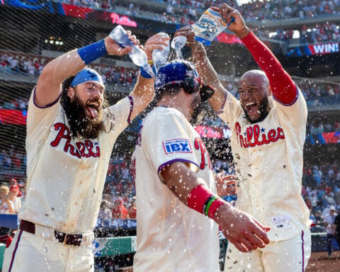 MLB home run leader Schwarber punctuates Phillies' unlikely comeback win over the Cardinals