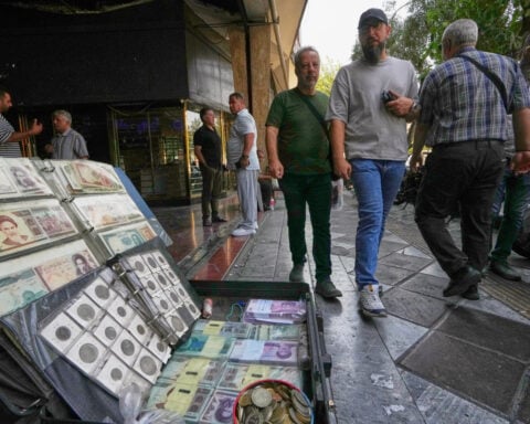 Iran's rial currency hits new record low as US prepares to announce more sanctions