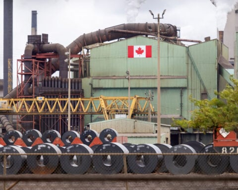 Trump threatens 50% tariffs on all cars and trucks from Canada amid trade fight