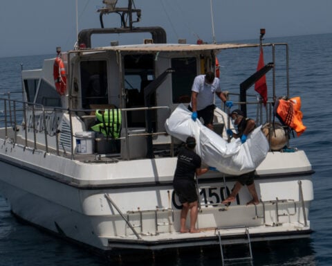 2 bodies recovered and about 12 missing after migrant boat capsized off Tunisian coast