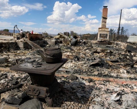 Fire crews gain ground on destructive blaze raging near Reno, Nevada