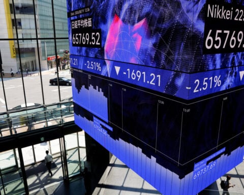 Asia shares fall on tech nerves; oil prices slip