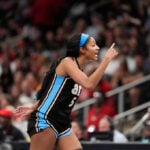 Angel Reese breaks WNBA single-game and season rebounding records as Dream beat Sparks 78-71