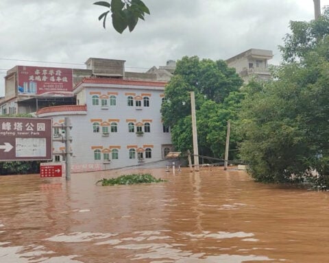 Homes submerged, tens of thousands relocated in China's south as flooding intensifies