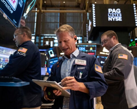 Falling oil prices help calm the stock and bond markets