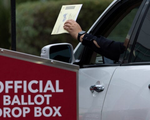 US Postal Service issues rules to tighten mail-in voting if court gives OK