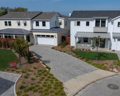 New US single-family home sales slide in July, confidence dips in August