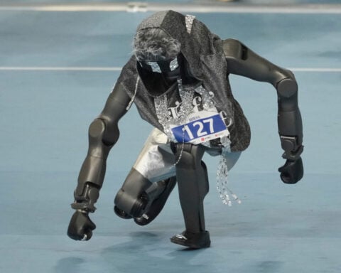 A Chinese humanoid robot sets a new 100-meter sprint record at Beijing Games