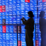 Asian stocks hesitant before Nvidia, oil slips on Hormuz hopes