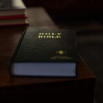 For over 100 years, travelers have checked into US motel rooms and found the Gideon Bible