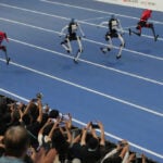 A robot sprinter shatters a 100-meter record again as sparks fly at China’s robot competition