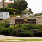 A judge suspends charges against an ex-Marine arrested on Trump's golf course with ammunition
