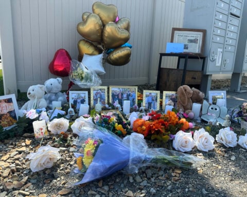 Investigators sift for evidence at burned Montana home where 8 family members were killed at dinner