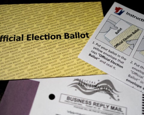 Judge blocks rule implementing Trump plan to restrict mail-in voting