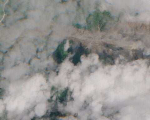 Nepal lake breaks banks, water level rising, district official says