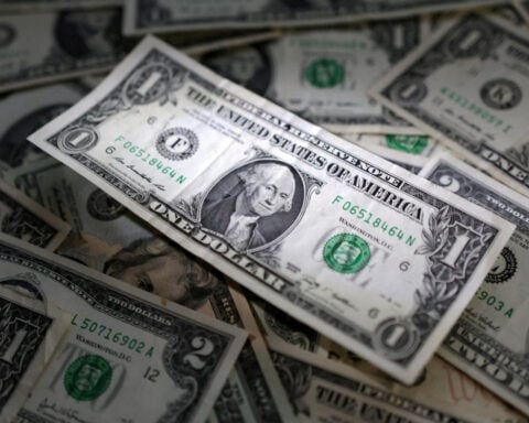 Dollar heads for weekly gain as Warsh remarks awaited