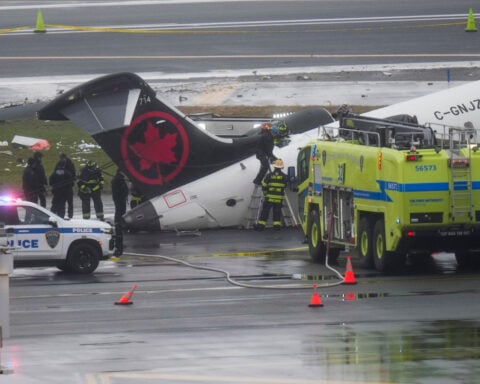 2 LaGuardia air traffic controllers left work an hour early before deadly crash, AP source says