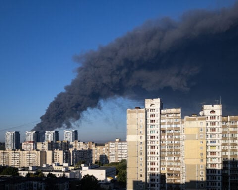 Russian attack on Ukrainian ammunition warehouse triggers waves of blasts, killing 37
