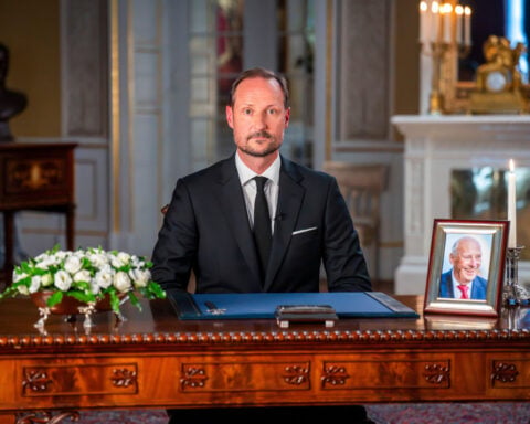 Norway's new king pays tribute to his late father as tens of thousands mourn