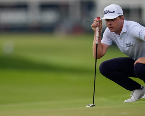 Hovland surges to a 1-shot lead at Tour Championship with cast of challengers lined up behind him