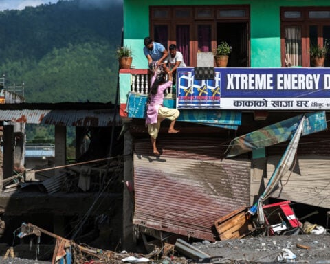 Rescuers battle floods and debris as Himalayan disaster death toll nears 800