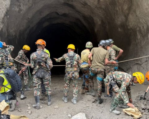 Nepal teams seek hundreds trapped in hydropower tunnels after deadly floods