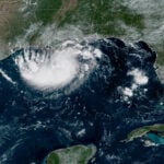 Tropical Storm Edouard heads for Texas and Louisiana while a storm moves toward Hawaii