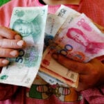 China reins in rising yuan as weak domestic demand clouds outlook