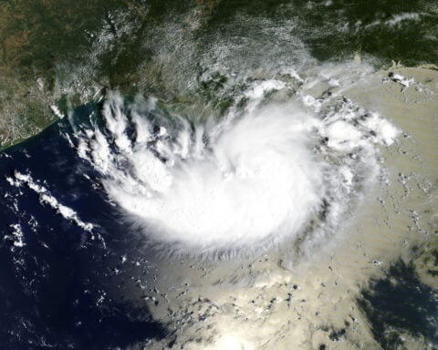 Tropical Storm Edouard moves ashore Gulf Coast near Texas-Louisiana border