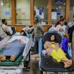 Indonesian officials say government-supplied meals tested after more than 500 students fall ill