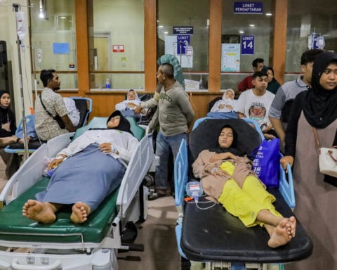 Indonesian officials suspect food poisoning from free school meal after more than 500 fall ill
