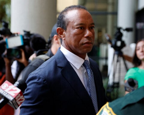 Golf-Woods gets 5-year license suspension in plea deal