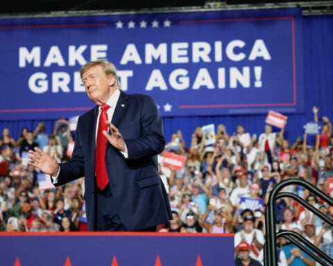 Trump vows to hit campaign trail hard for Republicans in tight midterms