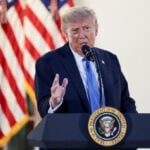 Trump signs bill to avert government shutdown before midterm elections