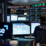 Oil prices edge lower, while Asian shares rise, tracking Wall Street gains
