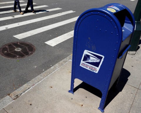 US judge again blocks Postal Service's mail-in voting restrictions
