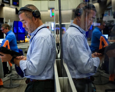 Yields, dollar rise, stocks ease after solid US jobs report
