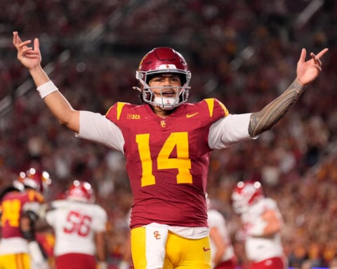 Maiava passes for 349 yards, hits frosh Mosley for 2 TDs in No. 14 USC's 39-0 rout of Fresno State