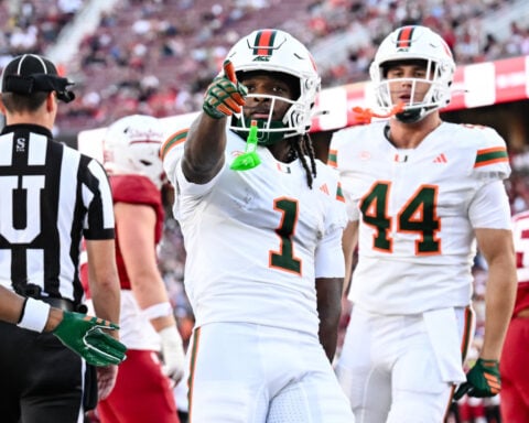 Mensah throws 5 TD passes, Toney sets record in No. 7 Miami's 45-6 win over Stanford
