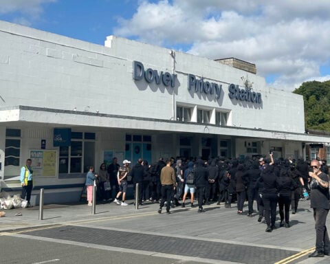 Masked men block roads into Dover port in England in apparent anti-immigrant protest